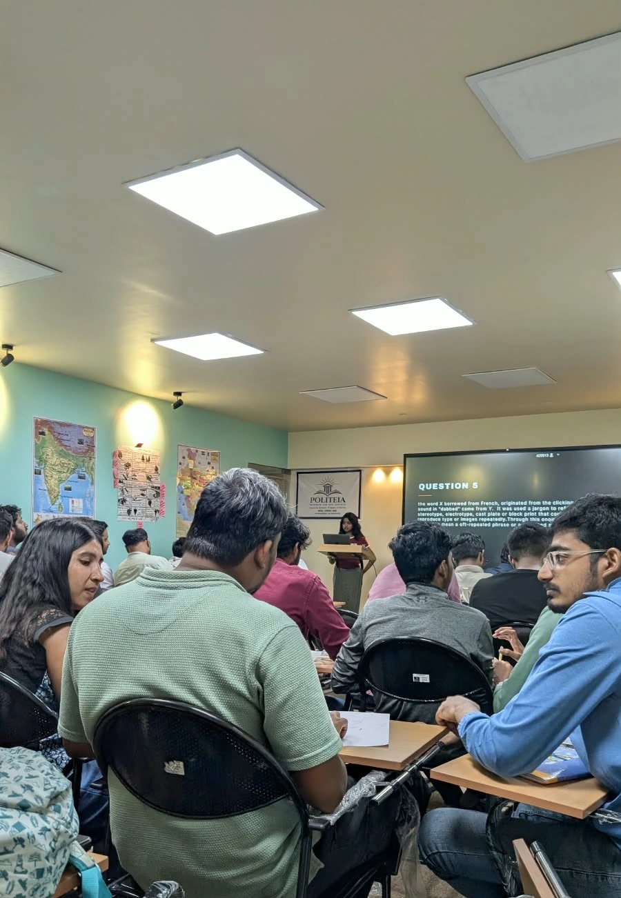 A team discussing an answer during a quiz